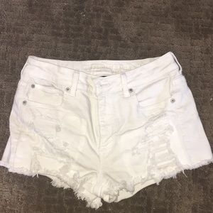 White distressed shorts